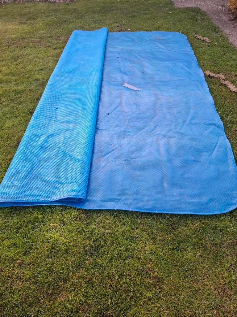 Isolerend afdekzeil zwembad, Ophalen, Afdekzeil