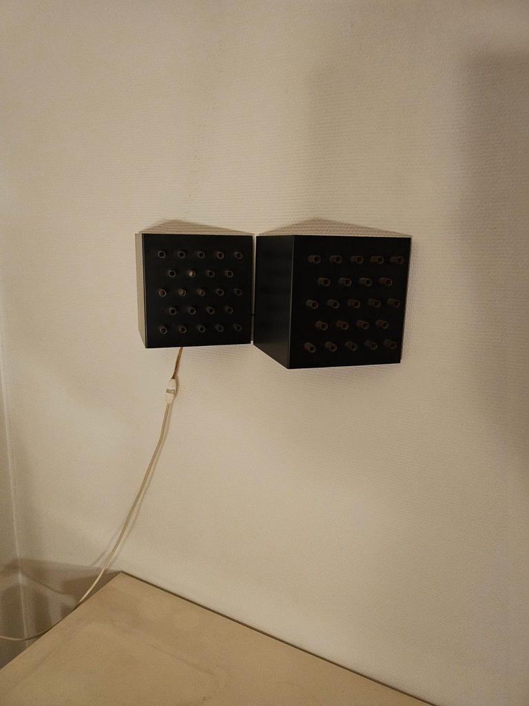 Raak wandlamp, Ophalen