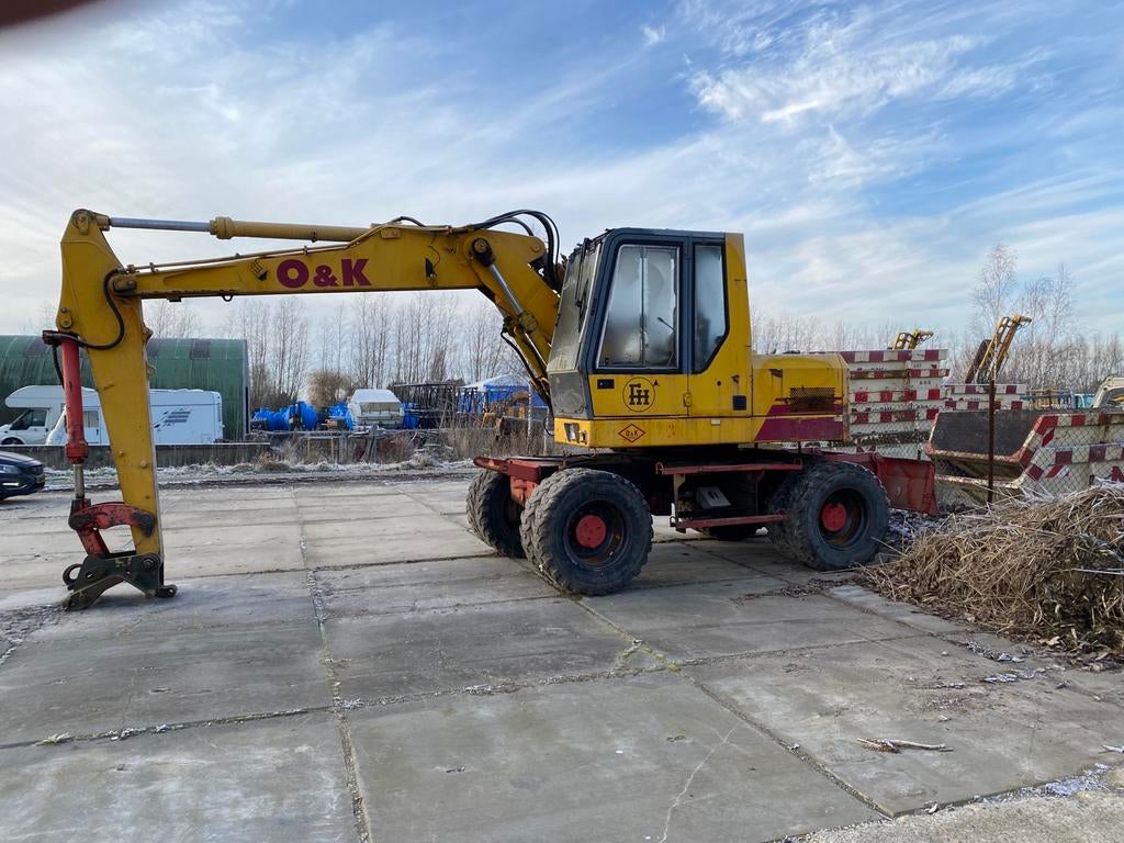 O&K Mobiele Bandenkraan MH City met kenteken, Zakelijke goederen, Machines en Bouw | Kranen en Graafmachines, Kraan, Ophalen of Verzenden