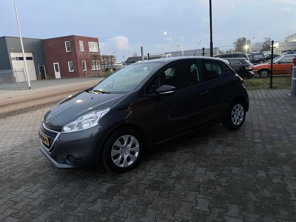 Peugeot 208 1.0 VTI 50KW/68PK 3-D 2014 Grijs, Auto's, Peugeot, Voorwielaandrijving, 68 pk, Origineel Nederlands, 24 km/l