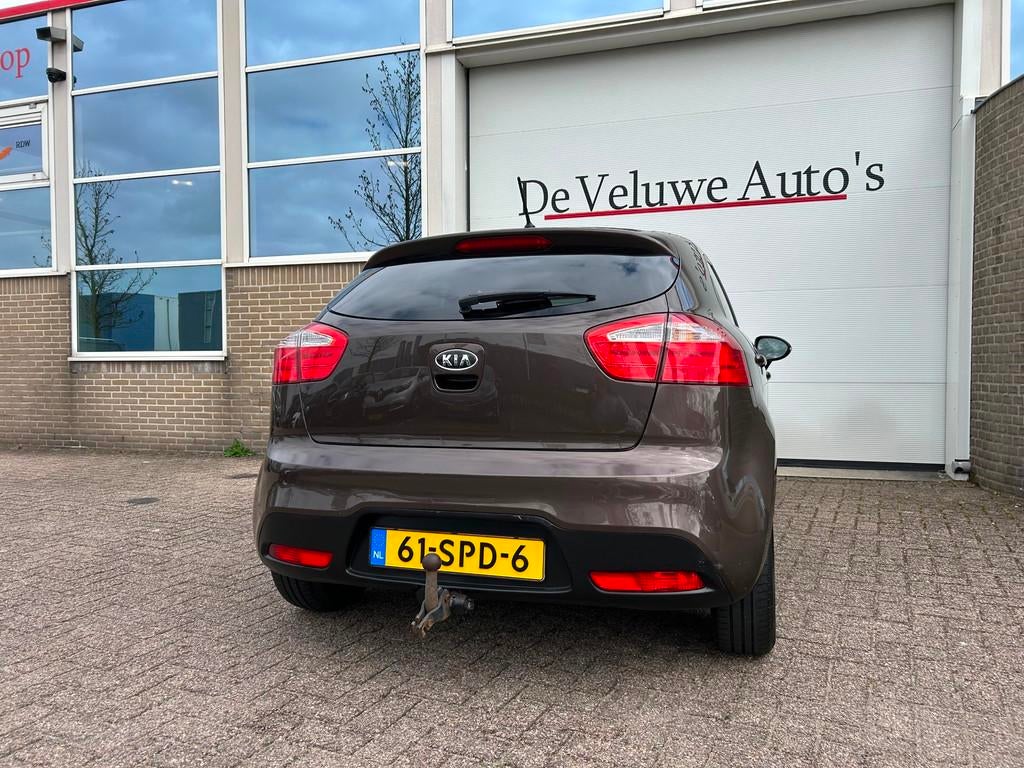 Kia Rio 1.2 CVVT Plus Pack|Trekhaak|Cruise|Airco|, Euro 5, Zwart, 4 cilinders, Bruin