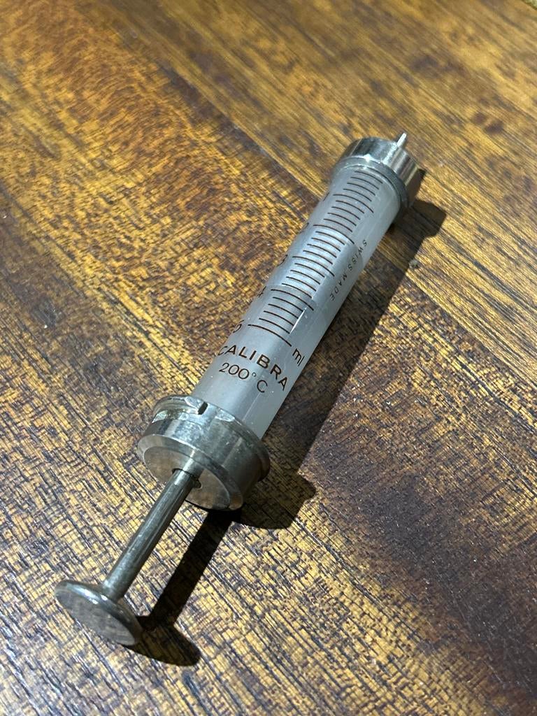 Antieke glazen spuit CALIBRA 200C SWISS MADE, Ophalen of Verzenden