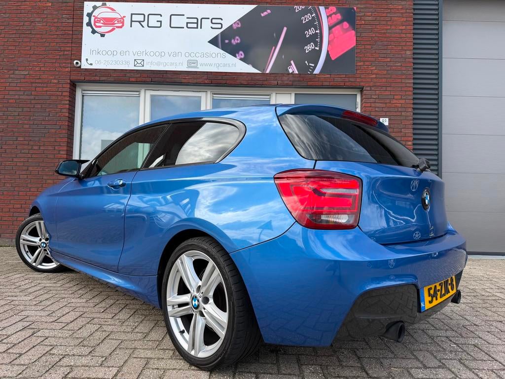 BMW 1-serie 114i Upgrade Edition / Leder / Navi / PDC / Carp, 1-Serie, Euro 5, Achterwielaandrijving, Gebruikt