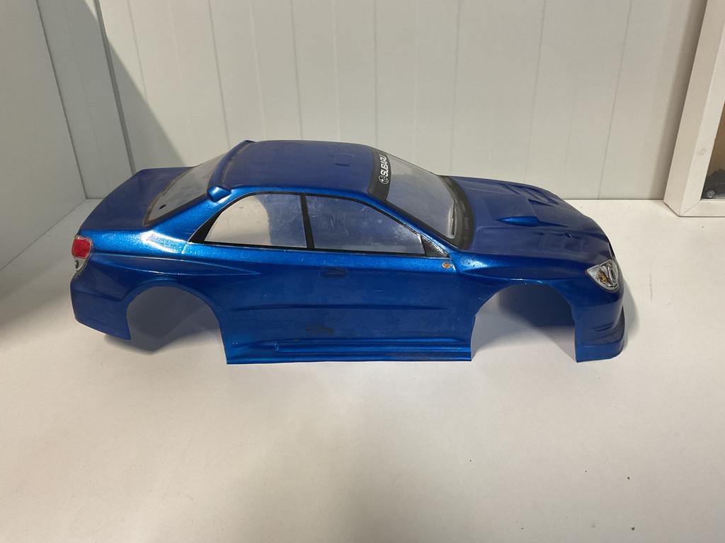 Subaru Impreza lexan body 1:10 zeer mooi, Ophalen, Zo goed als nieuw
