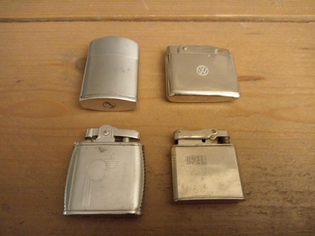 Zippo's (Ronson) / Opel/ Volkswagen, Ophalen of Verzenden, Zo goed als nieuw, Aansteker