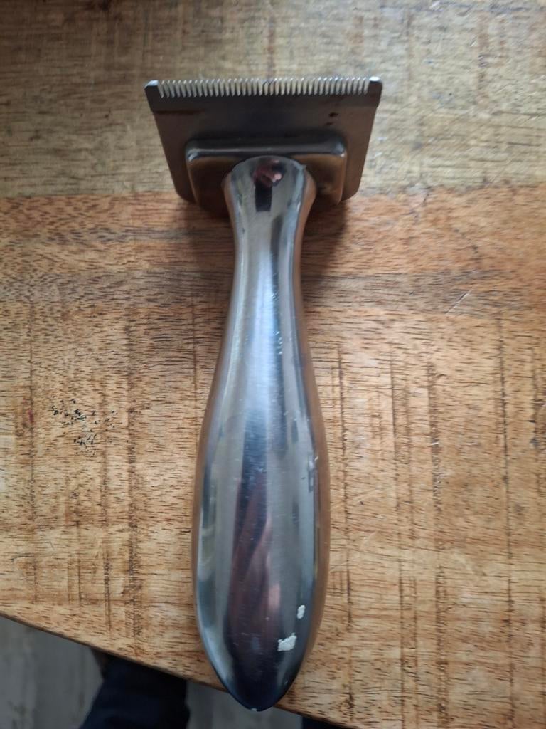 Trim schaar voor honden, Ophalen