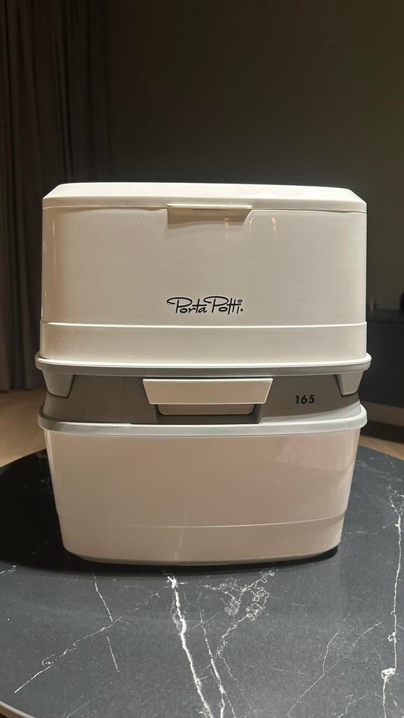 Porta potti 165, Ophalen, Zo goed als nieuw