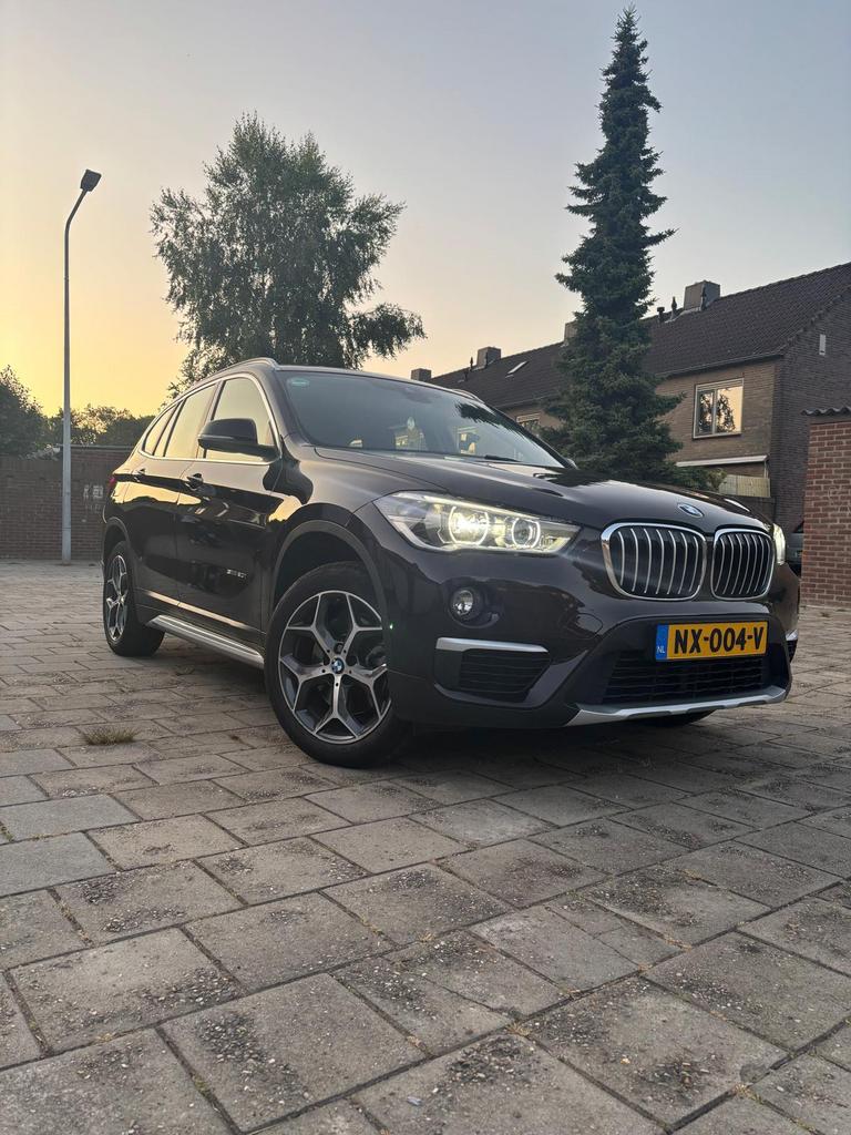 BMW X1 2.0 Sdrive 20I AUT 2017 Bruin, Auto's, BMW, 1998 cc, 1800 kg, Bruin, Origineel Nederlands