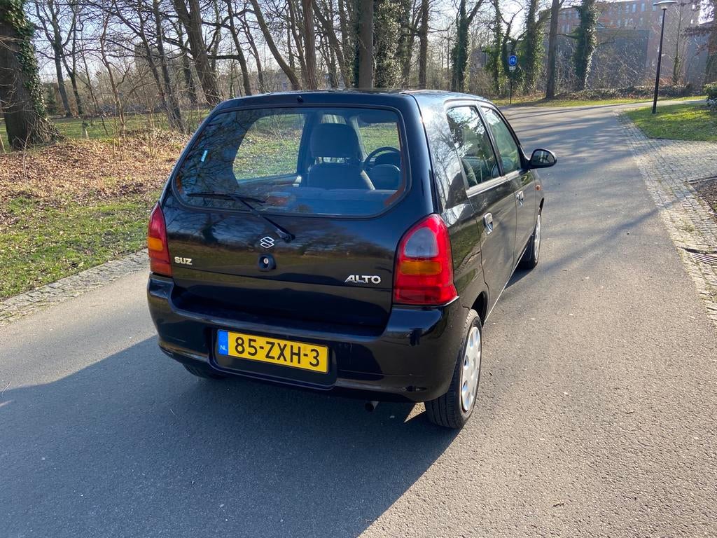 Suzuki Alto 1.1 16V 5d AGS 2003 Zwart Airco, Voorwielaandrijving, 4 cilinders, 4 stoelen, Zwart