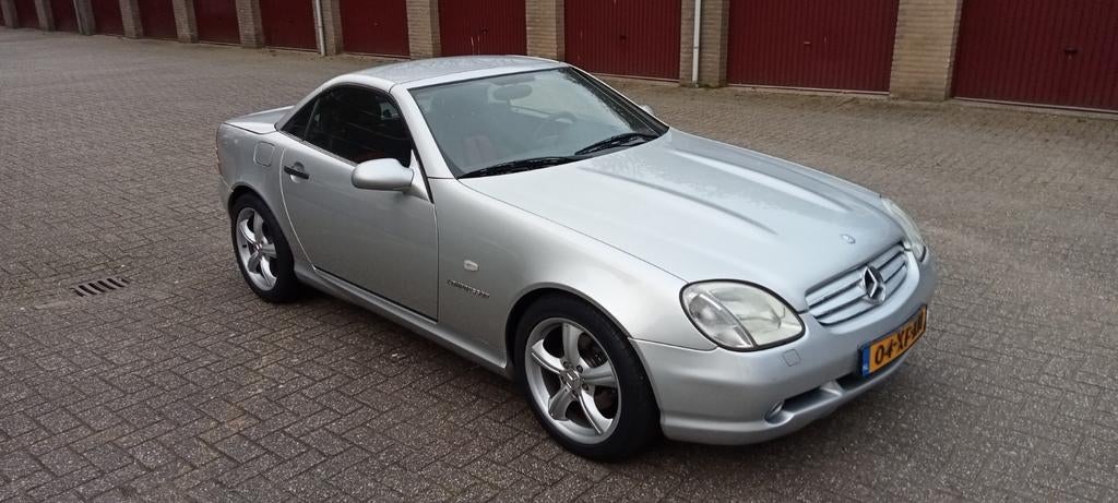 Mercedes-Benz SLK 2.3 Slk230 Kompr Roadster AUT 1997 Grijs, Auto's, Mercedes-Benz, Automaat, Achterwielaandrijving, 4 cilinders