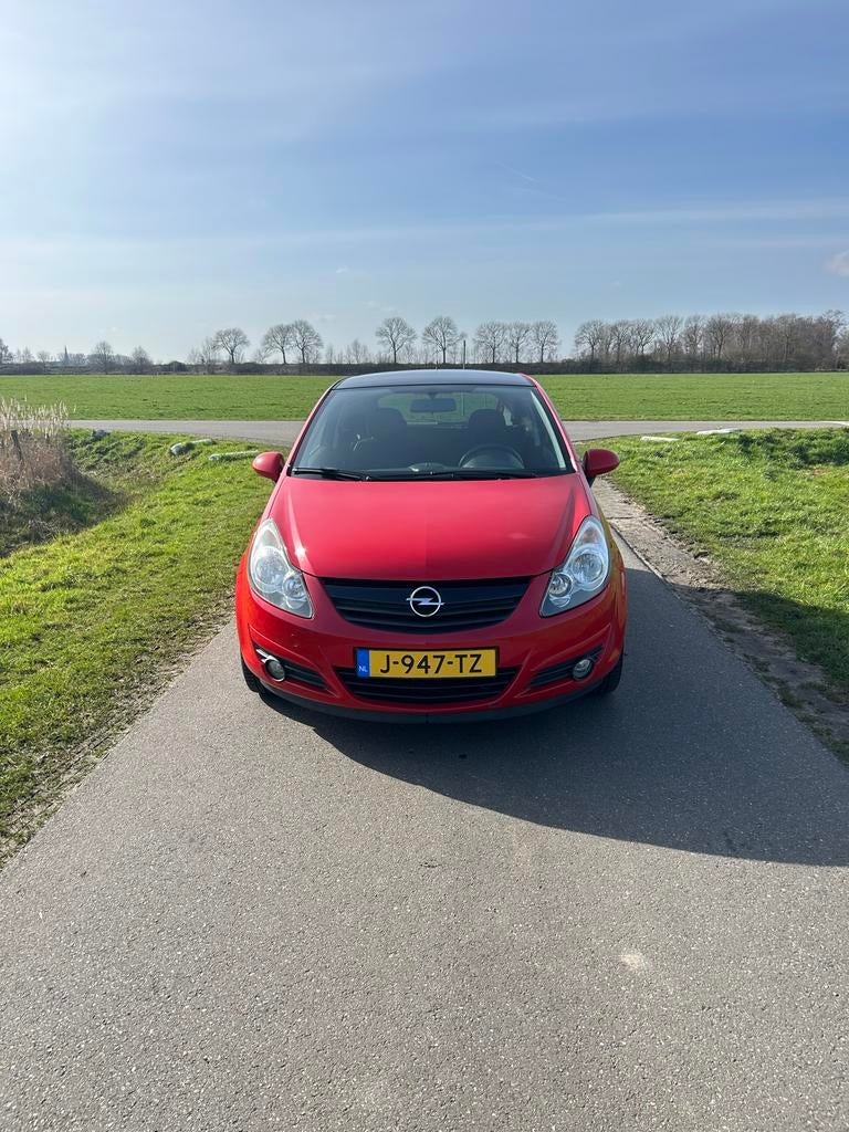 Opel Corsa 1.2 16V 3D WR 2009 Rood, Auto's, Opel, Voorwielaandrijving, 450 kg, 40 €/maand, Zwart