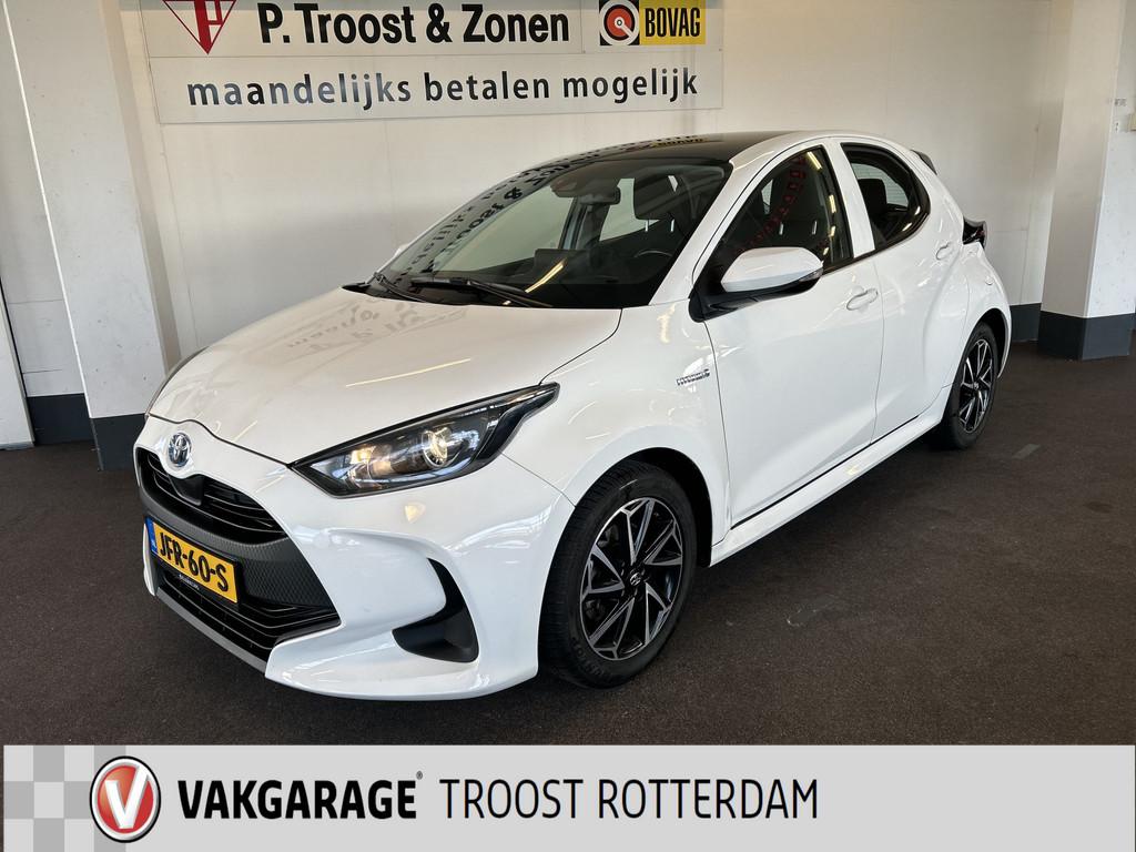 Toyota Yaris 1.5 Hybrid 115 Business Automaat | Panoramadak, Gebruikt, Met garantie (alle), 450 kg, Wit