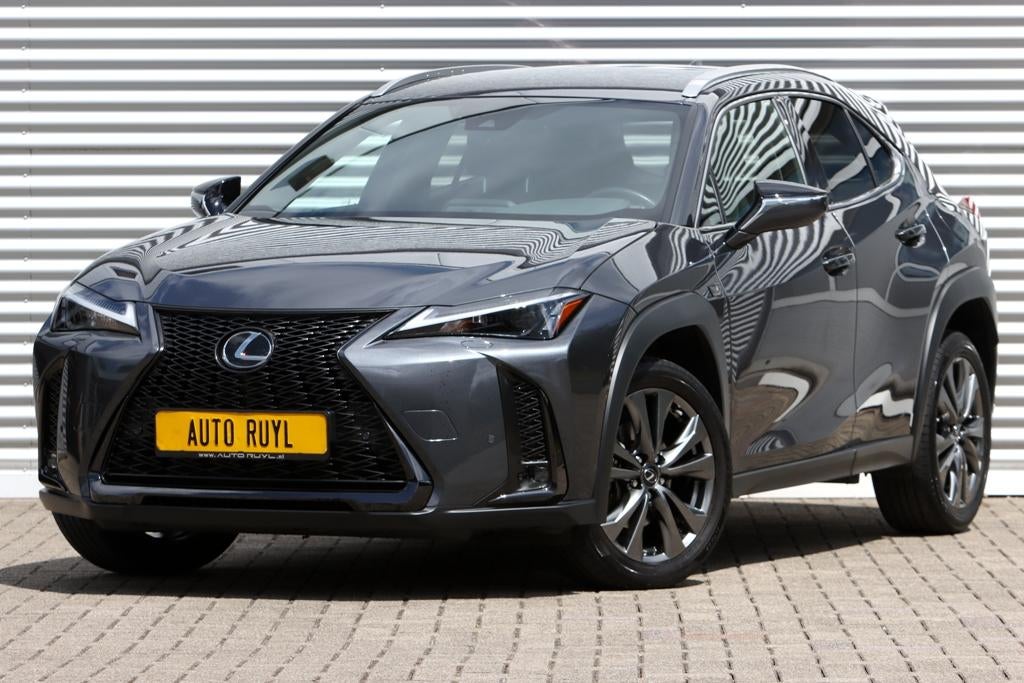 Lexus UX 250h F Sport Design Leer / Navi / Carplay, Auto's, Lexus, Gebruikt, Zwart, 4 cilinders, Bedrijf