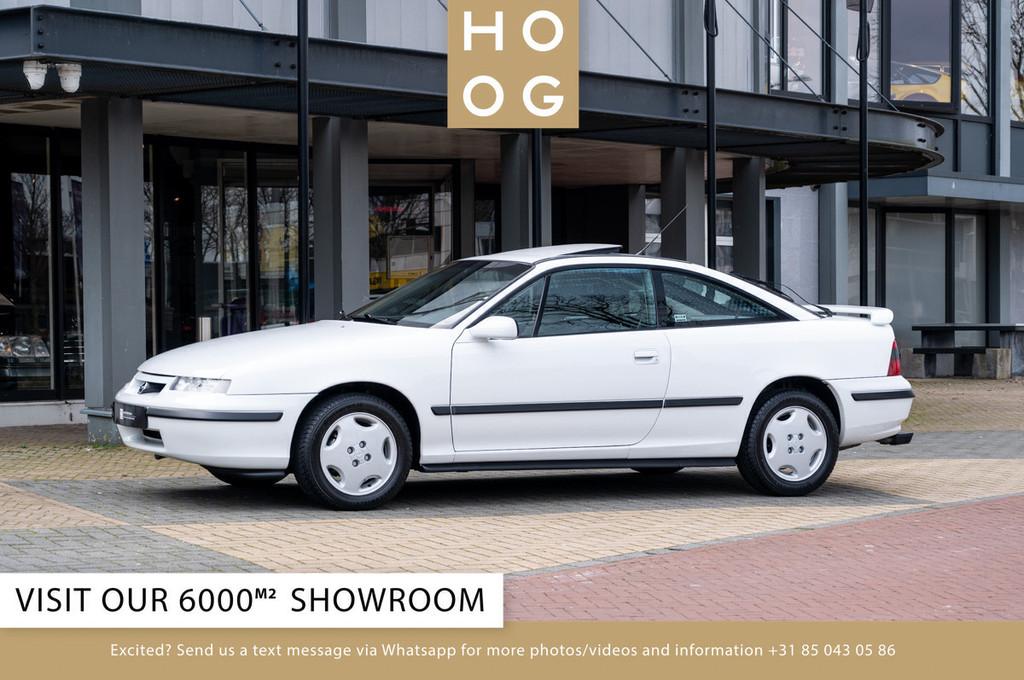 Opel Calibra 2.0i 16V (bj 1996), Auto's, Oldtimers, Lederen bekleding, 1998 cc, 136 pk, Zwart