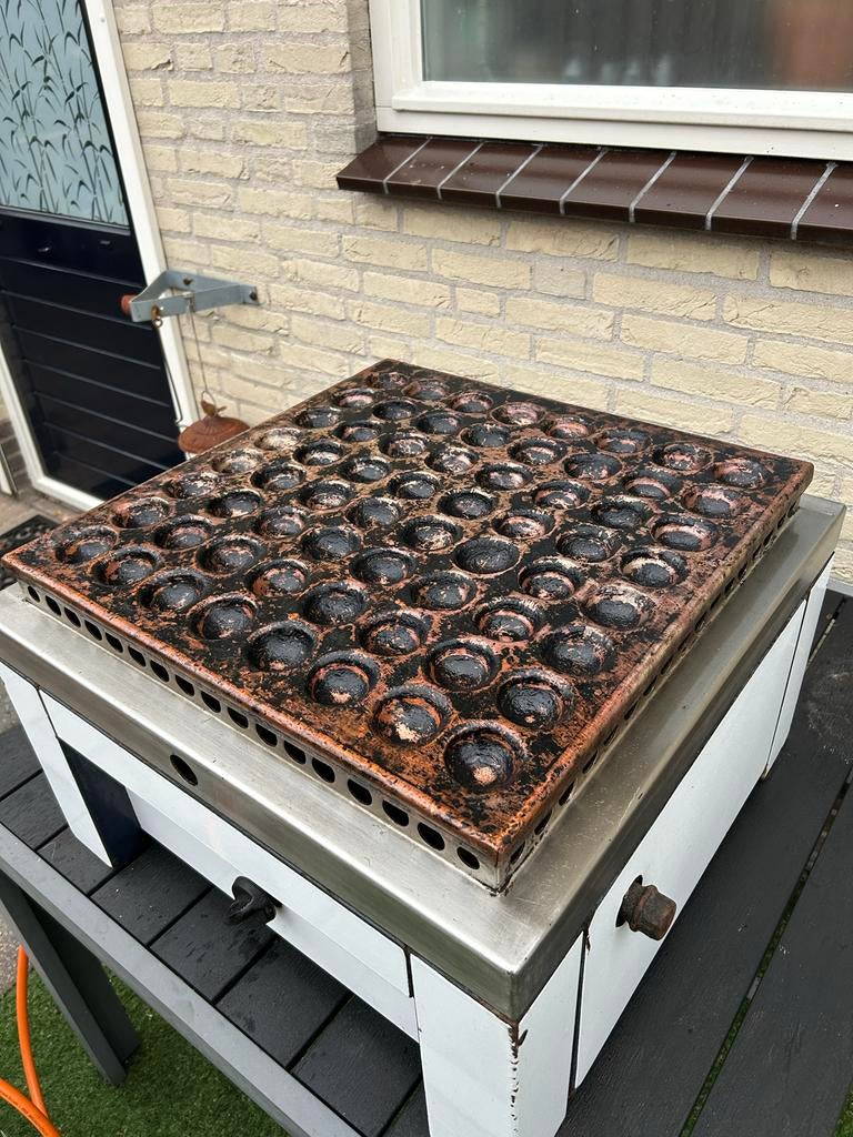 Poffertjesplaat, Ophalen