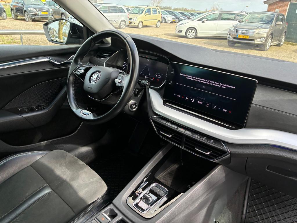 Skoda Octavia Combi 1.0 e-TSI Business Edition Plus | Half/L, Gebruikt, Leder en Stof, Hybride Elektrisch/Benzine, 3 cilinders