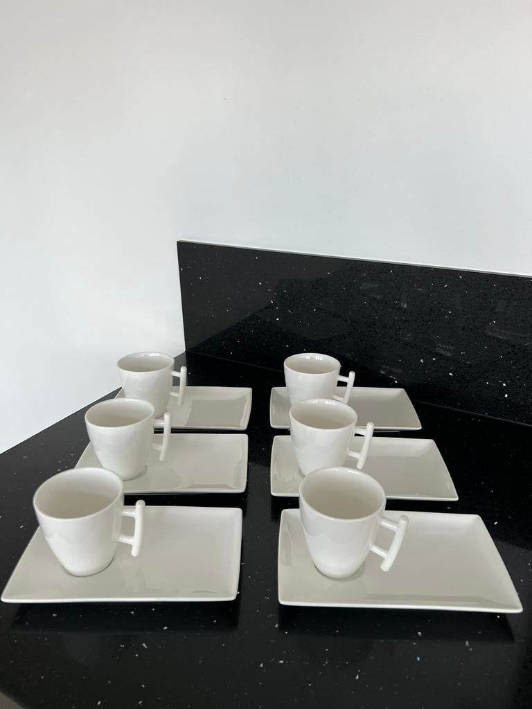 Kop en schotel Yong Squito Porseleinen servies, Huis en Inrichting, Keuken | Servies, Ophalen of Verzenden, Zo goed als nieuw