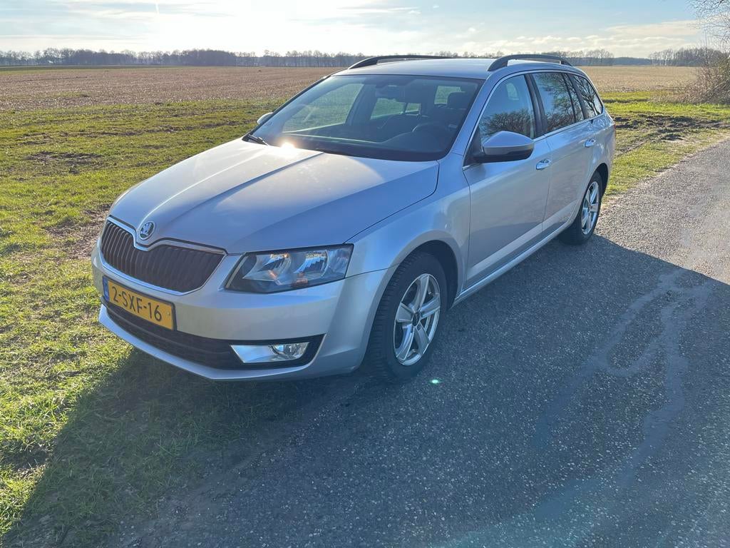Zuinige 1/17km Skoda Octavia 1.2 TSI 77KW Combi 2014 Grijs, Auto's, Skoda, Voorwielaandrijving, Stof, 4 cilinders, 1297 kg