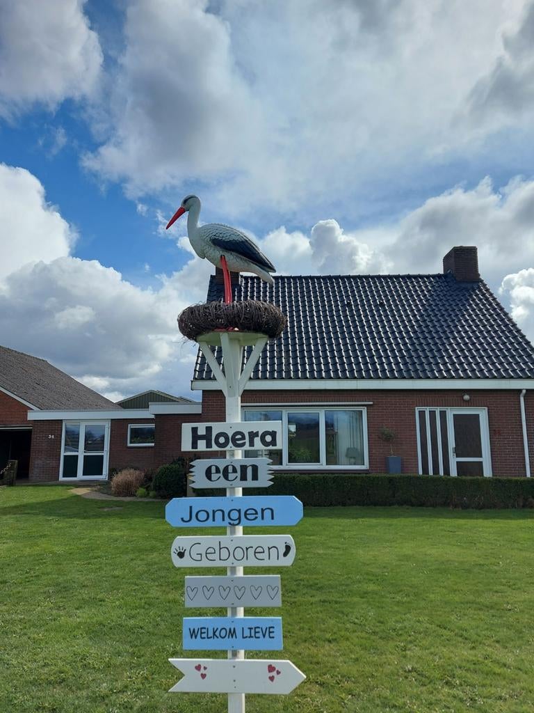 Geboortebord te huur, Ophalen