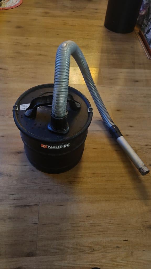 Aszuiger voor openhaard of kachel, Ophalen