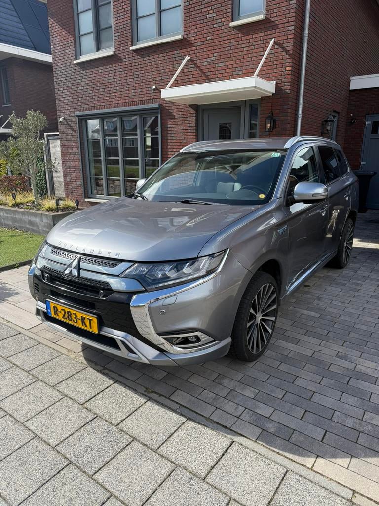 Mitsubishi Outlander 2.4 Dohc Mivec Phev 240pk 4WD Aut 2020, Auto's, Automaat, Stof, Outlander, Zwart