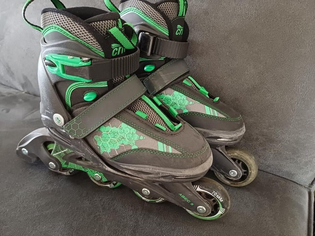Zwarte en groene inline skates verstelbaar maat 32 t/m 36, Ophalen of Verzenden, Zo goed als nieuw, Inline skates 4 wielen