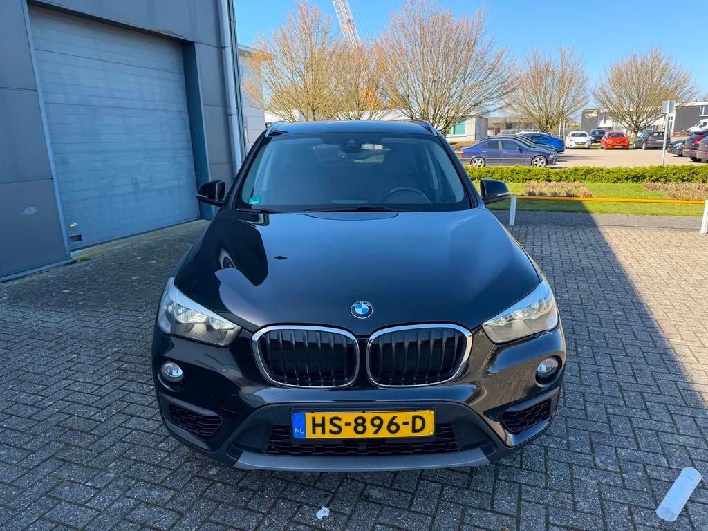 BMW X1 SDrive18d Corporate Lease Essential 2015, Stof, 4 cilinders, 150 pk, Zwart