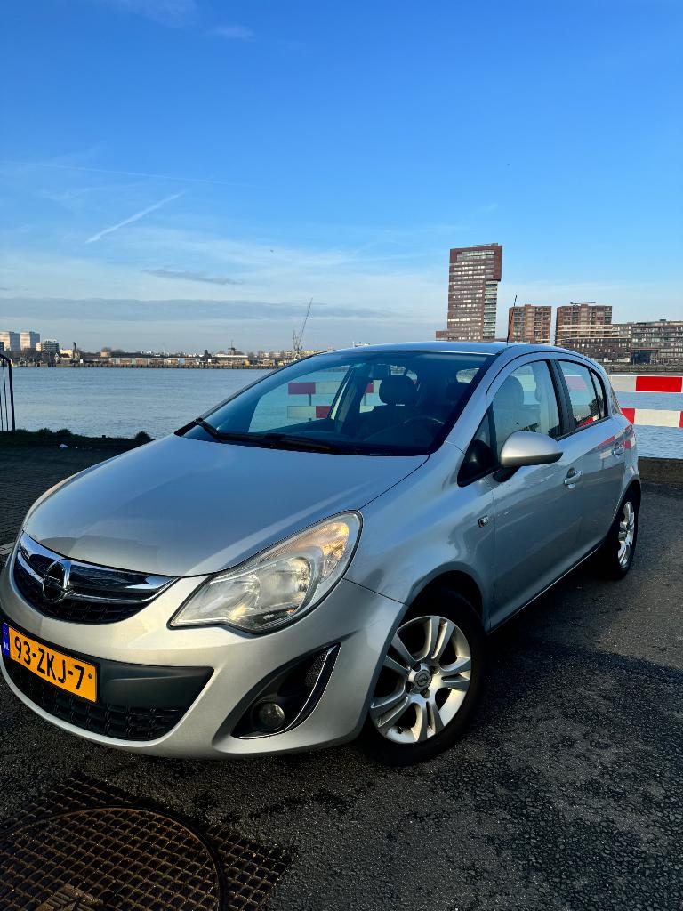 Opel Corsa 1.3 Cdti 70KW 5D 2012 Grijs, Auto's, Opel, Voorwielaandrijving, Origineel Nederlands, Particulier, Zilver of Grijs