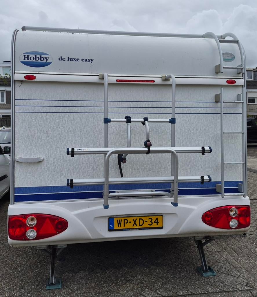 Caravan Hobby 500 kmfe met stapelbed en vast bed., Caravans en Kamperen, Vast bed, Kachel, Hobby, Treinzit