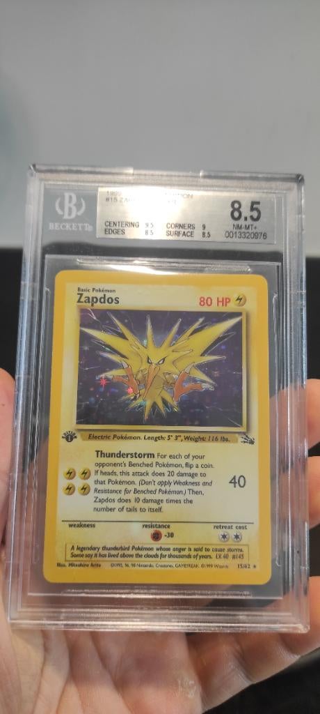 Zapdos fossil holo 1st edition BGS 8.5, Hobby en Vrije tijd, Verzamelkaartspellen | Pokémon, Ophalen of Verzenden, Zo goed als nieuw