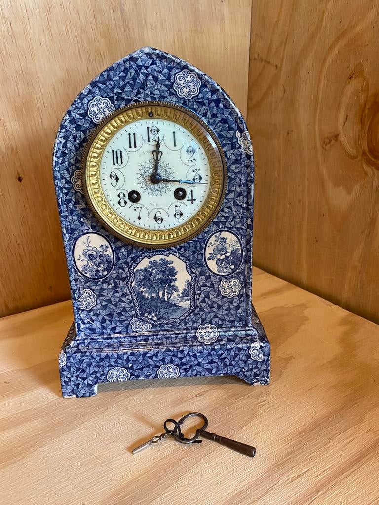 Delfs blauw staan klok, Ophalen