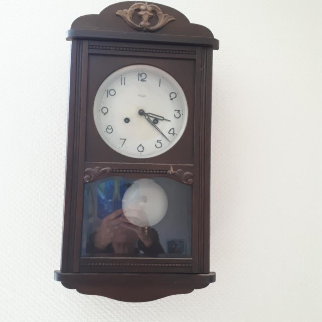 Kienzle wandklok met slinger en opwindsleutel, Ophalen