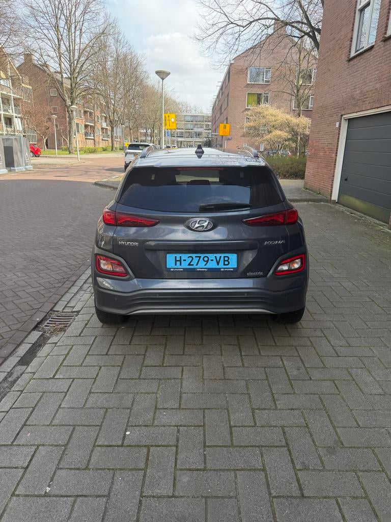 Hyundai Kona EV 64 kwh 204pk 2WD Aut. 2020 Grijs, Auto's, 14 kWh, Origineel Nederlands, Elektrisch, 420 min