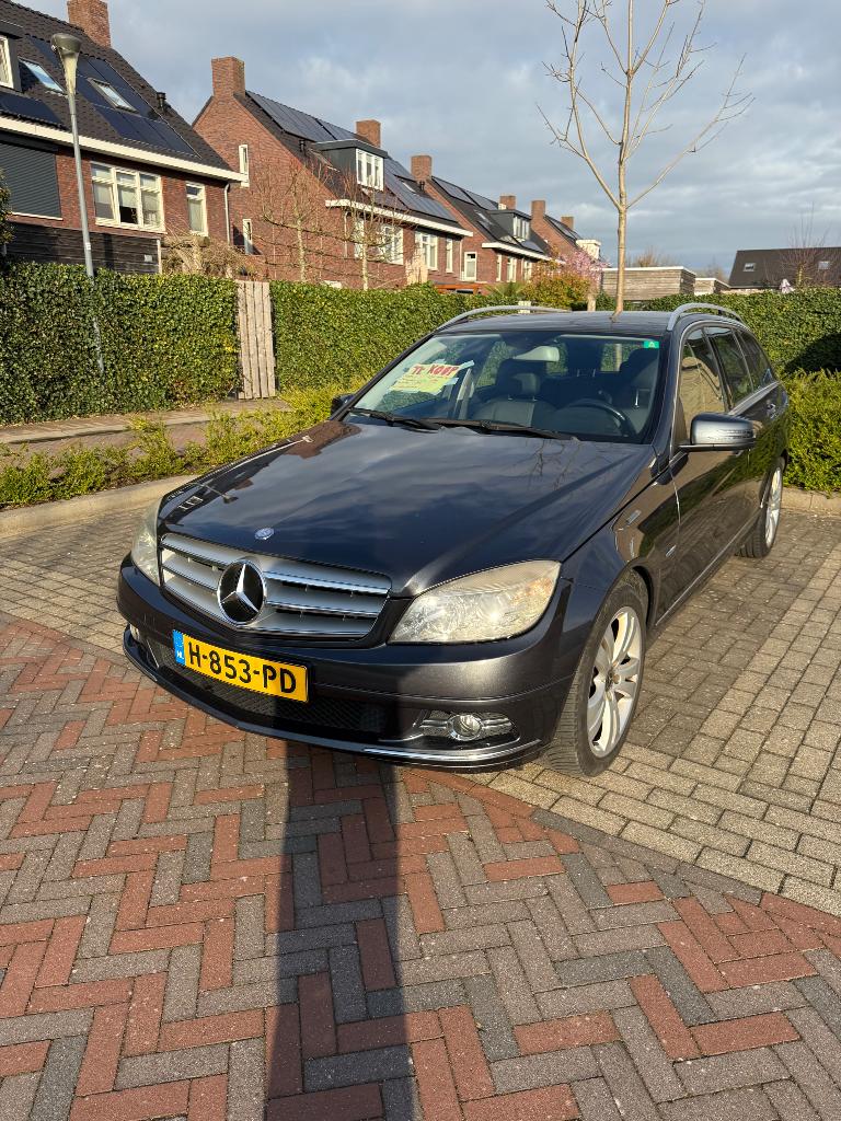 Mercedes-Benz C-Klasse C180 Kompr. Estate AUT 2009 LPG G3, Achterwielaandrijving, Leder en Stof, Grijs, Euro 4