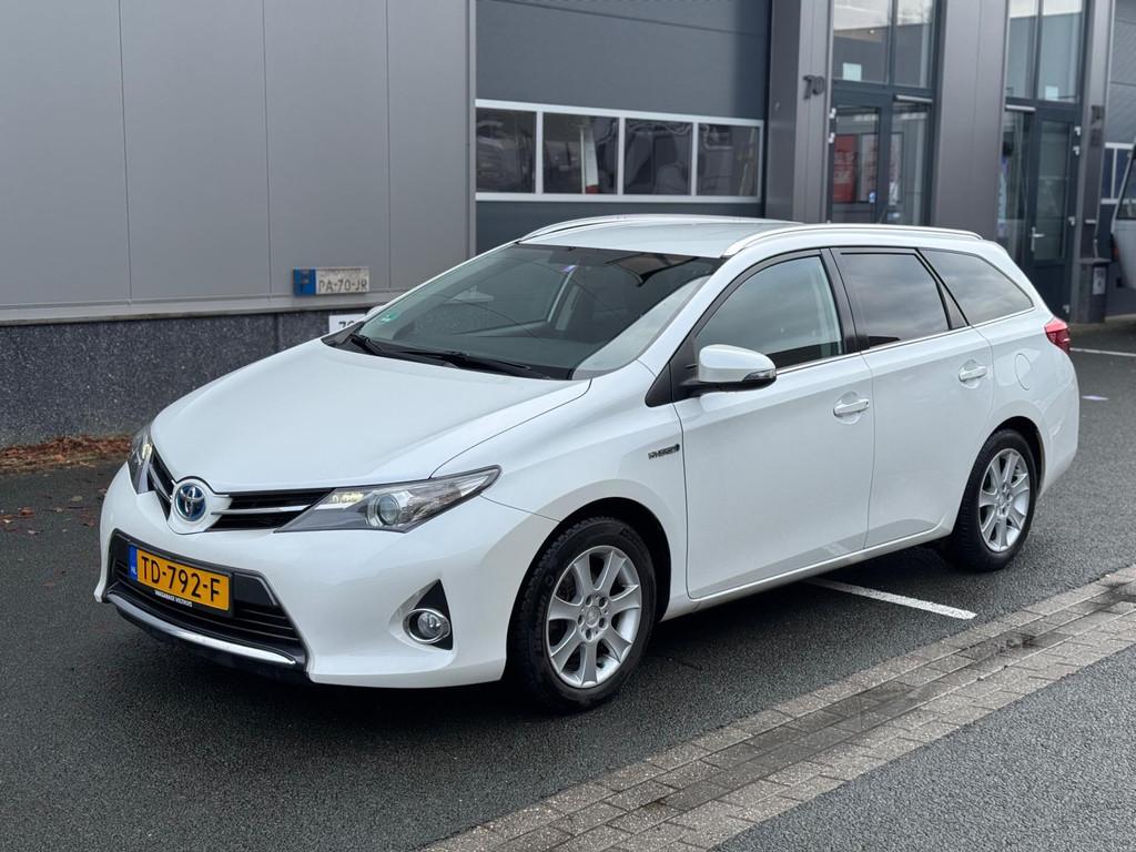 Toyota Auris Touring Sports 1.8 Hybrid Lease, Auto's, Euro 5, Stof, Gebruikt, Wit
