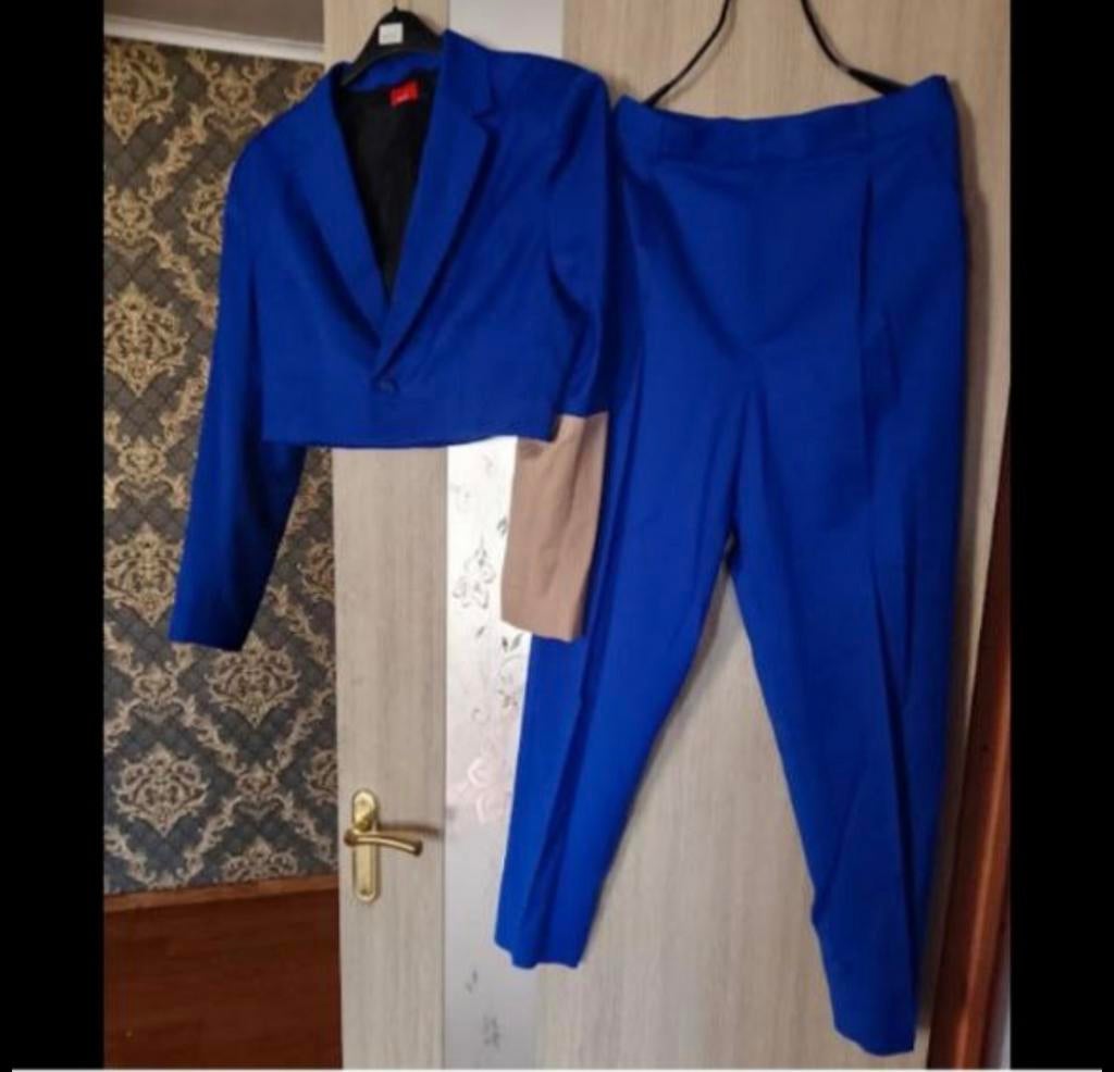 Blauw pak van Oekraïense ontwerper Maat M, Maat 38/40 (M), Kostuum of Pak, Blauw, Ophalen of Verzenden