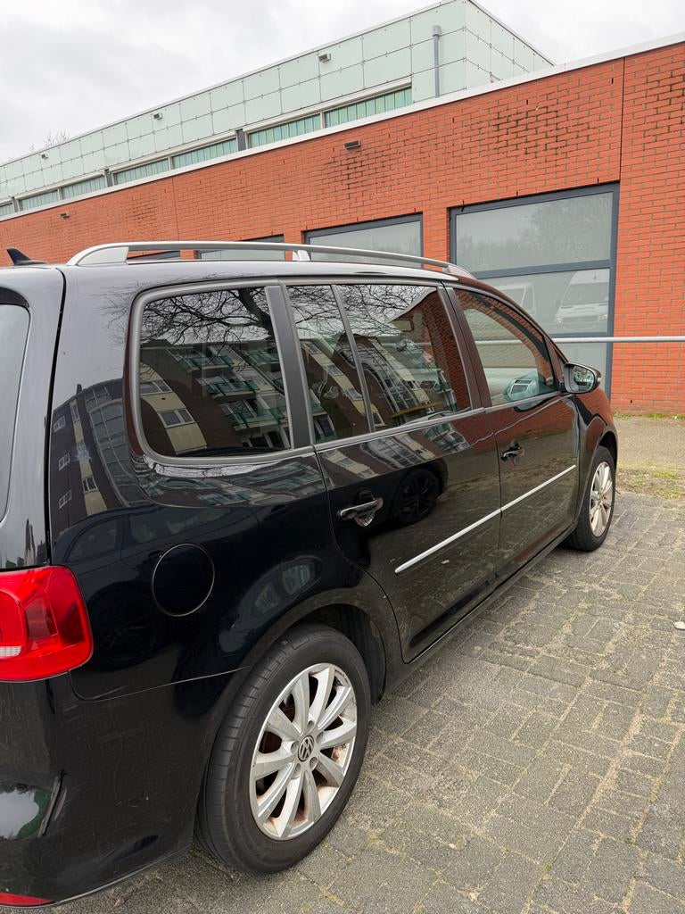 Volkswagen Touran 1.2 TSI 77KW BMT 2011 Zwart, Auto's, Volkswagen, 730 kg, 4 cilinders, Zwart, Origineel Nederlands
