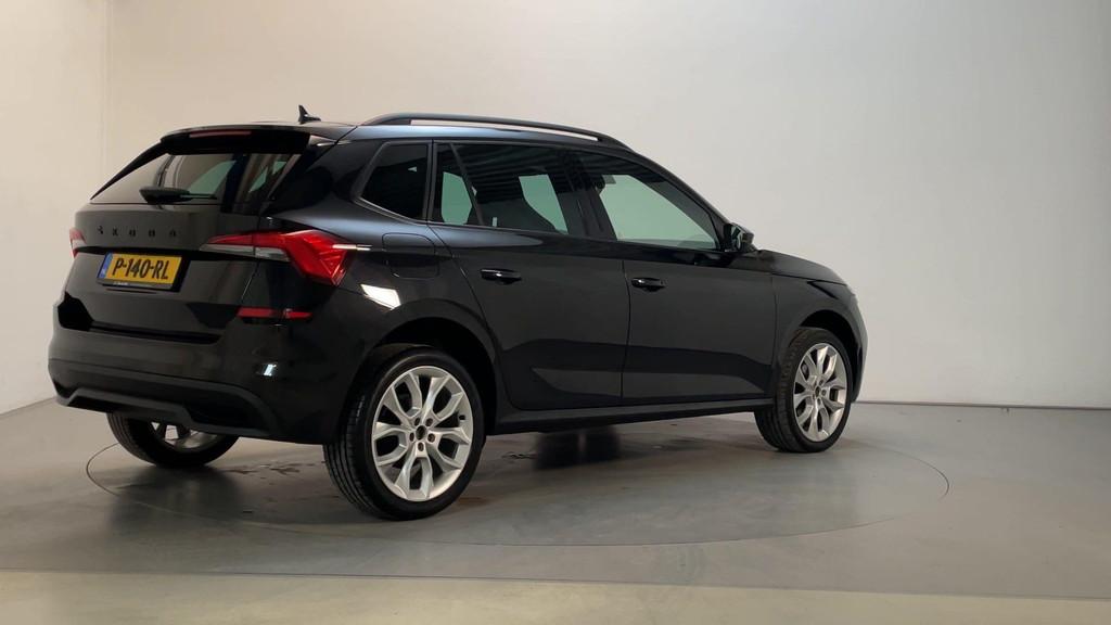 Skoda Kamiq 1.0 TSI DSG Sport Business Stoelverwarming App-C, Stof, Gebruikt, Met garantie (alle), Zwart