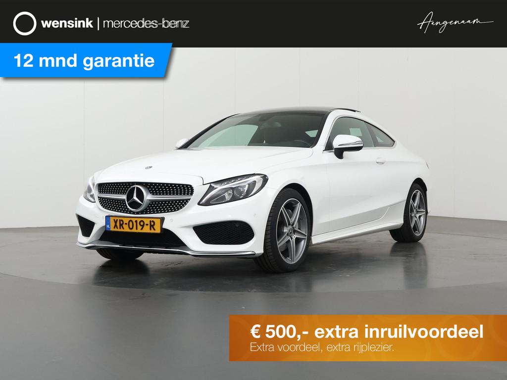 Mercedes-Benz C-klasse Coupé 180 Premium Plus | AMG Styling, Auto's, Achterwielaandrijving, 4 stoelen, Wit, Lichtsensor