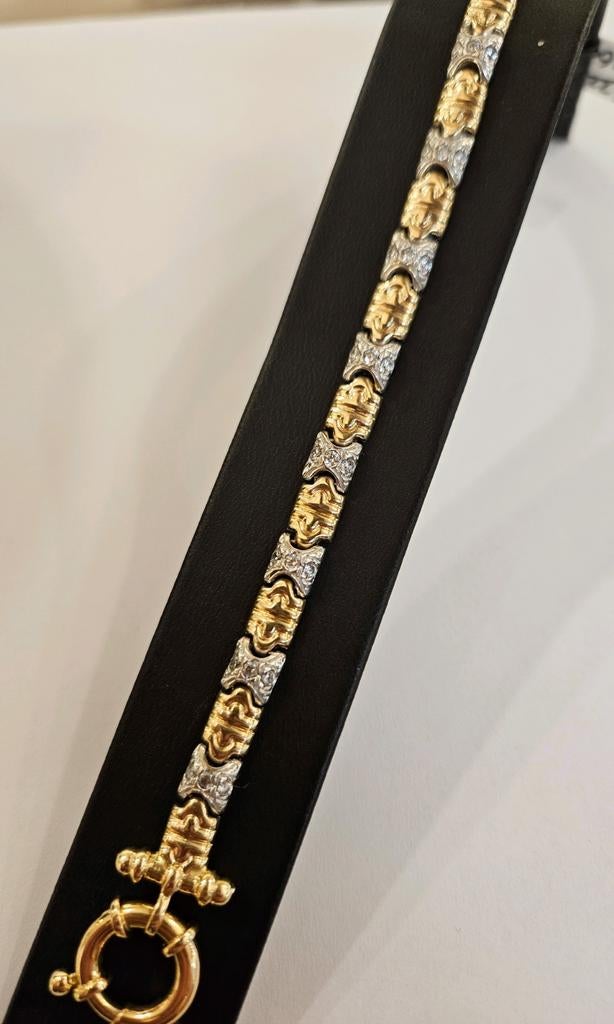 14 karaats gouden bicolor Bulgari schakel armband 19cm, Met kristal, Ophalen of Verzenden, Zo goed als nieuw, Goud