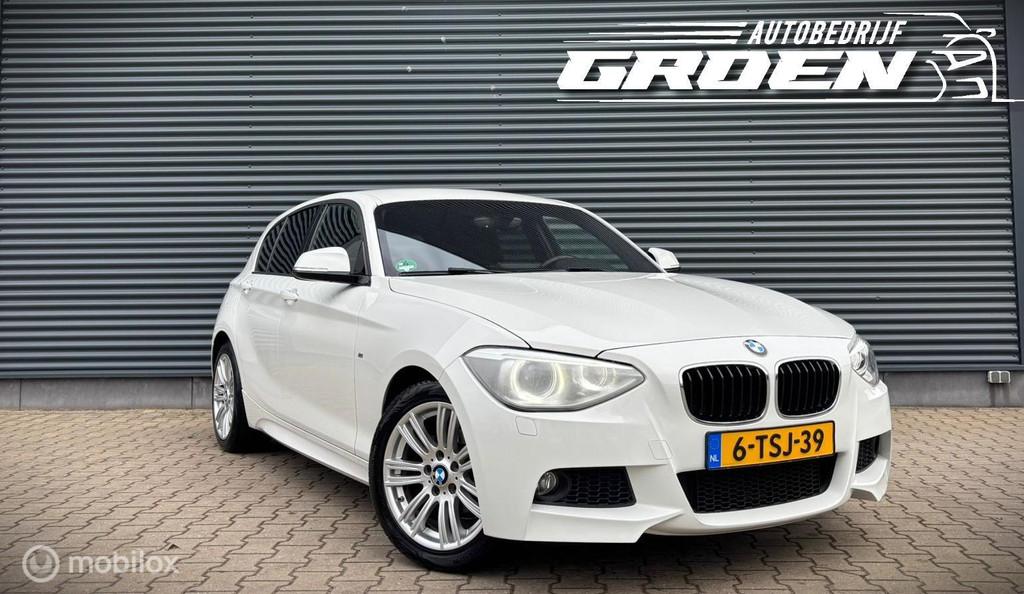 BMW 1-serie 116i High Executive M-PAKKET|PDC|STOELVERWARMING, Gebruikt, 4 cilinders, Wit, Origineel Nederlands