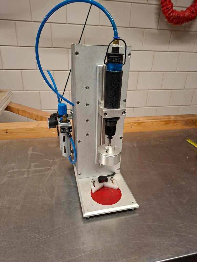 Doppensluit machine zgan, Ophalen