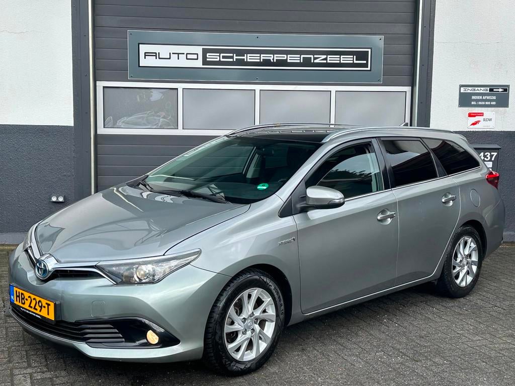 Toyota Auris 1.8 Hybrid Lease Pro | PANO | NAVI | NL AUTO, Gebruikt, Euro 6, Grijs, Te koop