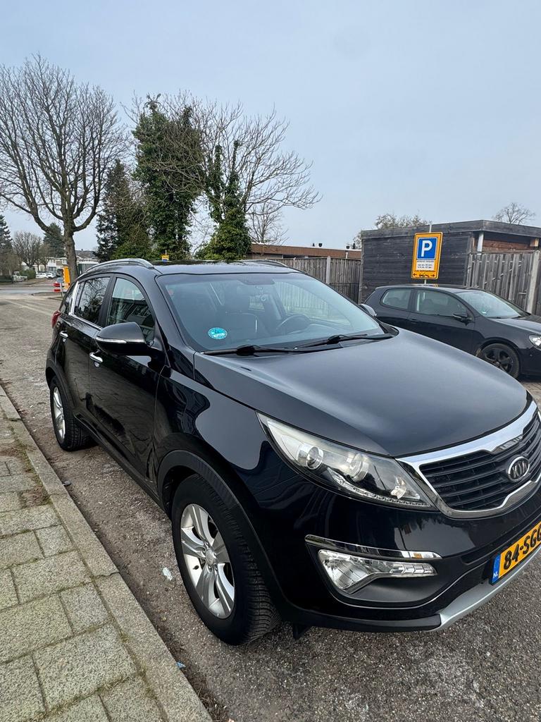 Kia Sportage 1.6 GDI 135pk Ecodynamics 2011 Zwart, Auto's, 1280 kg, 4 cilinders, Leder en Stof, Zwart