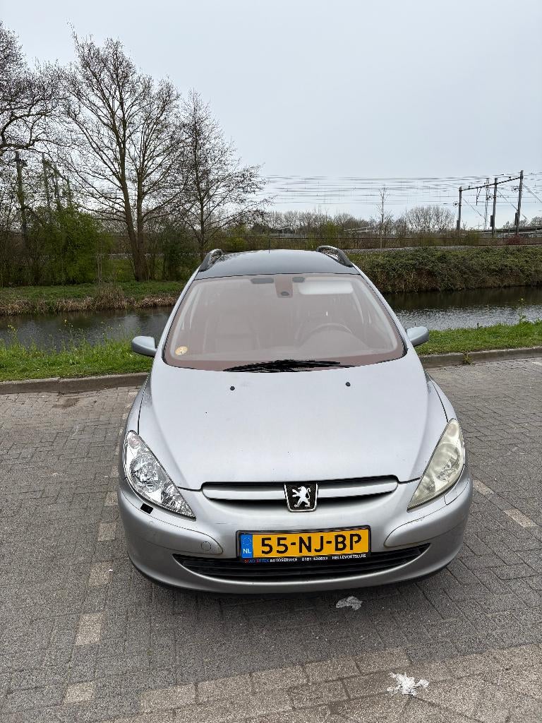 Peugeot 307 2.0SW 7zits, 2003 Grijs, Auto's, Peugeot, Voorwielaandrijving, 1330 kg, 136 pk, Zwart