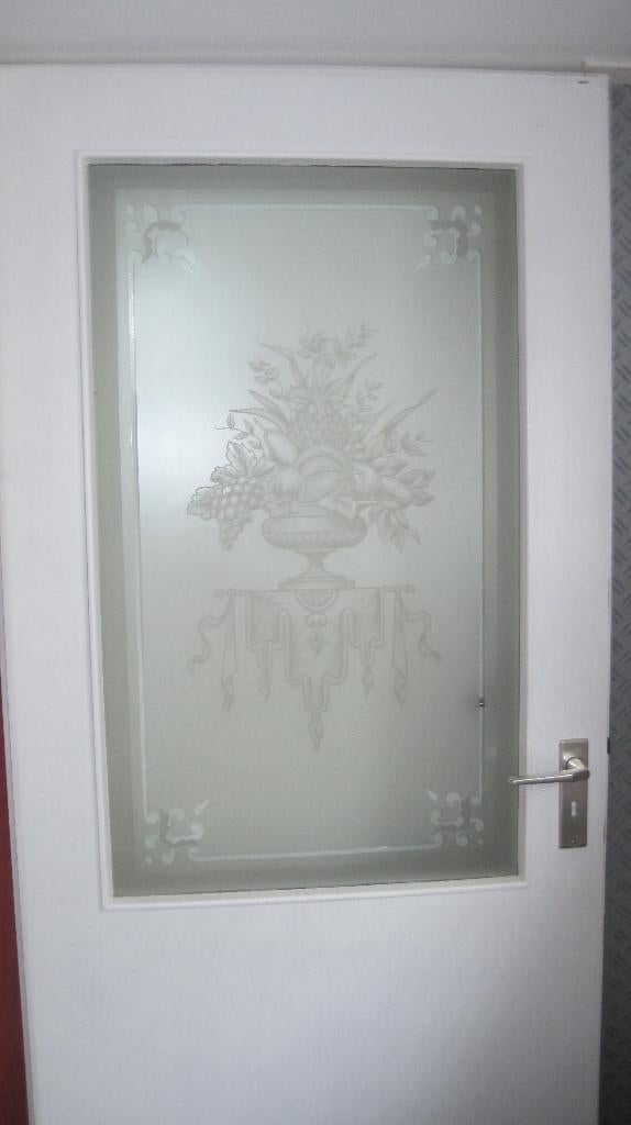 Geëtste glazen deurruit, Ophalen