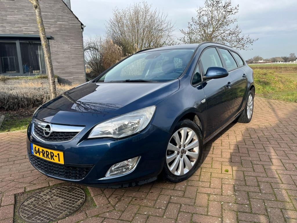Opel Astra 1.4 Turbo 88KW ST 2011 Blauw, Auto's, Voorwielaandrijving, Parkeersensor, Stof, 4 cilinders