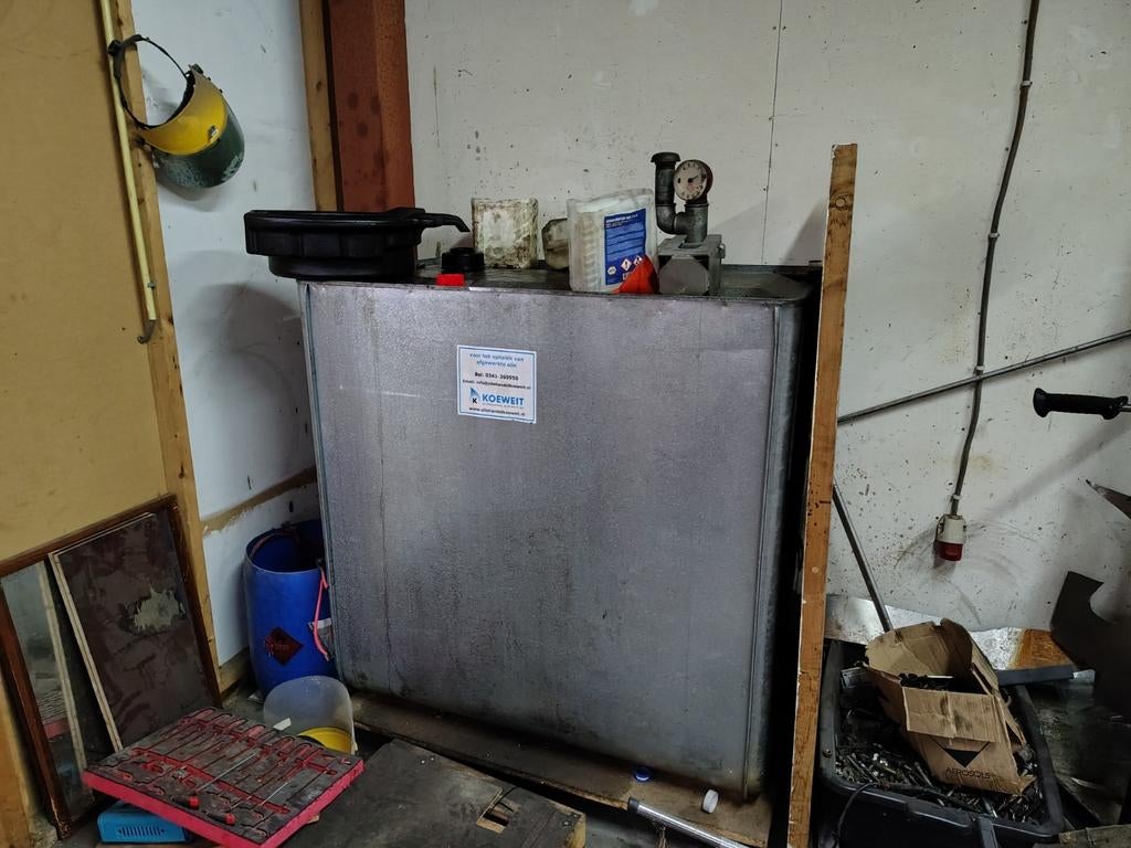 Olie opvang vat 1000 liter, Ophalen