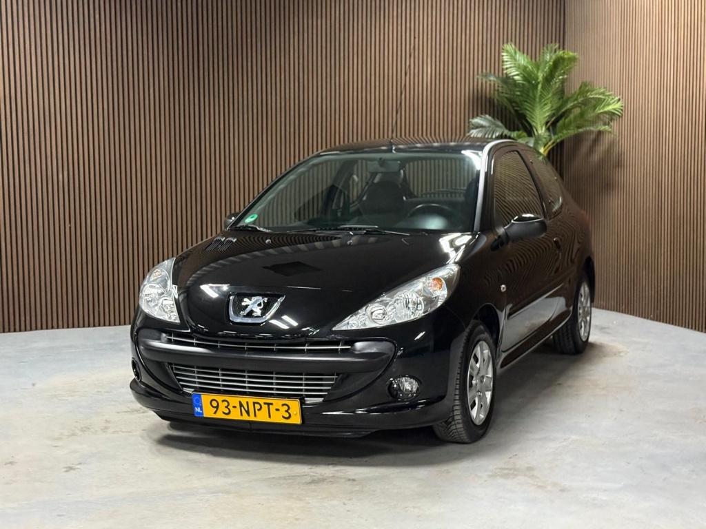 Peugeot 206+ 1.4 XS (bj 2010), Auto's, Peugeot, 31 €/maand, 4 cilinders, Zwart, Origineel Nederlands