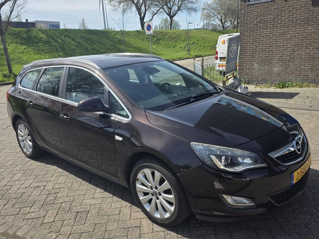 Opel Astra |Tourer |1.4 Sport Automaat ||Lees advertentie||, Auto's, Euro 5, Zwart, 4 cilinders, Bruin